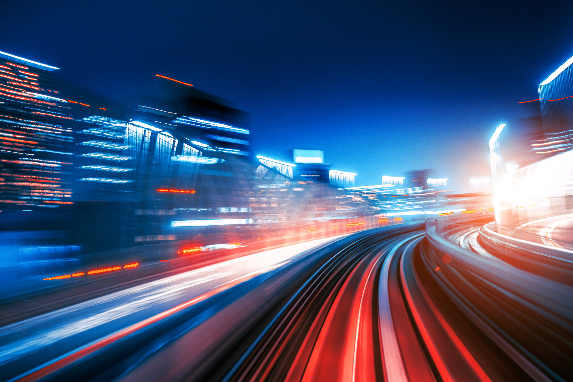 © iStock-962650288_Nikada (High Speed Motion Blur driving through a tunnel at night Futuristic High Speed Monorail Train Tokyo, Japan)